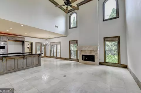 Living - 8385 Royal Melbourne Way, Duluth, GA 30097 photo 15 of 17