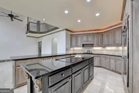 Kitchen - 8385 Royal Melbourne Way, Duluth, GA 30097 photo 3 of 10