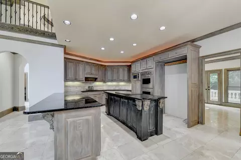 Kitchen - 8385 Royal Melbourne Way, Duluth, GA 30097 photo 2 of 10