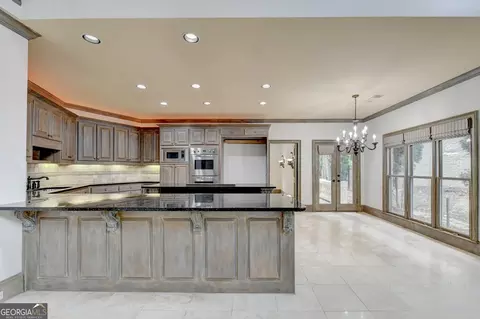 Kitchen - 8385 Royal Melbourne Way, Duluth, GA 30097 photo 9 of 10