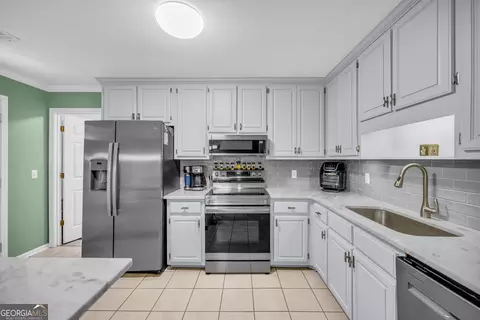Kitchen - 484 Foote Mcclellan Rd, Colbert, GA 30628 photo 3 of 4