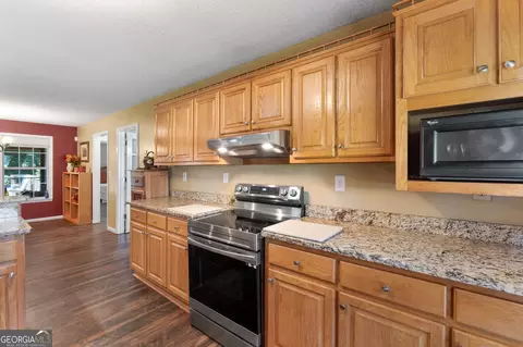 Kitchen - 258 Thomas Rd, Milner, GA 30257 photo 1 of 3