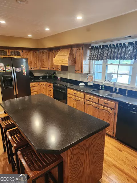 Kitchen - 238 Five Points Rd, Milner, GA 30257 photo 3 of 3
