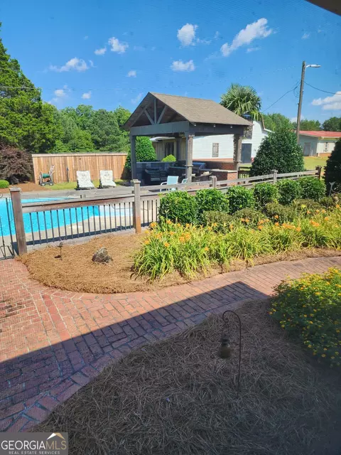 Exterior - 238 Five Points Rd, Milner, GA 30257 photo 5 of 43