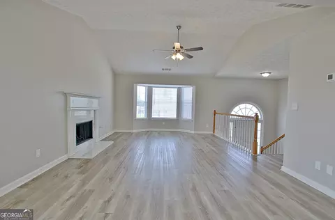 Living - 10592 Marigold Ct, Hampton, GA 30228 photo 7 of 11
