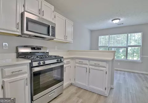 Kitchen - 10592 Marigold Ct, Hampton, GA 30228 photo 2 of 3