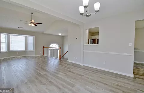Living - 10592 Marigold Ct, Hampton, GA 30228 photo 6 of 11