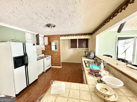 Kitchen - 395 Lang Rd, Covington, GA 30014 photo 4 of 4