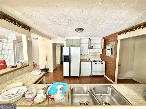 Kitchen - 395 Lang Rd, Covington, GA 30014 photo 2 of 4