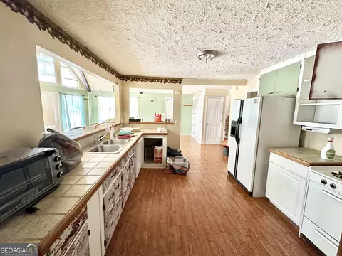 Kitchen - 395 Lang Rd, Covington, GA 30014 photo 1 of 4