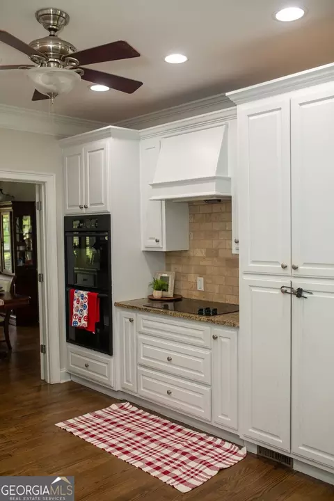 Kitchen - 2233 M P Harrison Rd, Monroe, GA 30655 photo 3 of 7