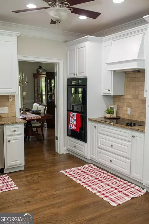 Kitchen - 2233 M P Harrison Rd, Monroe, GA 30655 photo 4 of 7