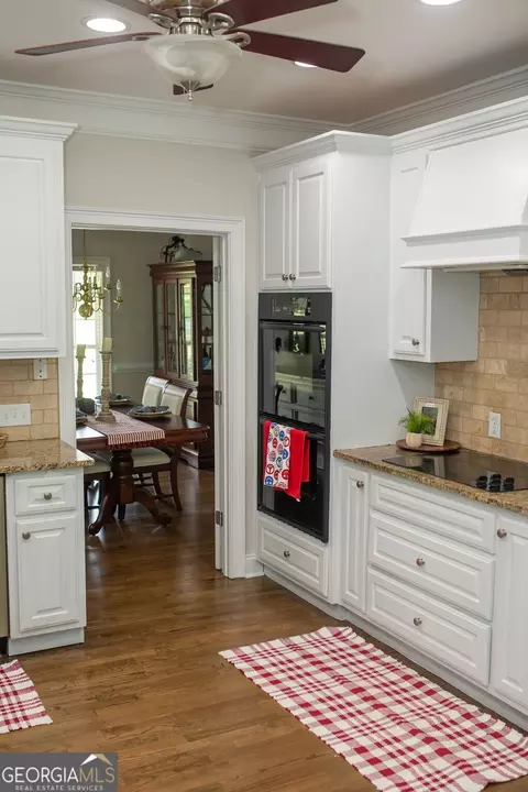 Kitchen - 2233 M P Harrison Rd, Monroe, GA 30655 photo 5 of 7