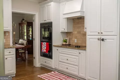 Kitchen - 2233 M P Harrison Rd, Monroe, GA 30655 photo 6 of 7