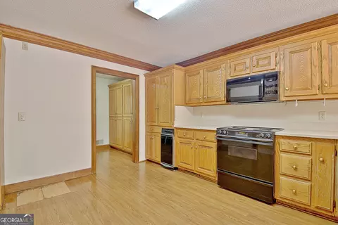Kitchen - 348 Huckaby Rd, Brooks, GA 30205 photo 2 of 4