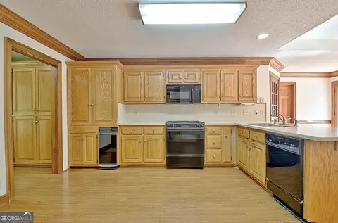 Kitchen - 348 Huckaby Rd, Brooks, GA 30205 photo 3 of 4