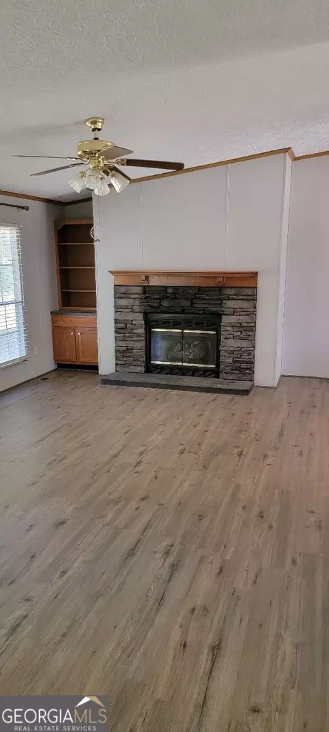Living - 866 Stallings Rd, Haddock, GA 31033 photo 1 of 3