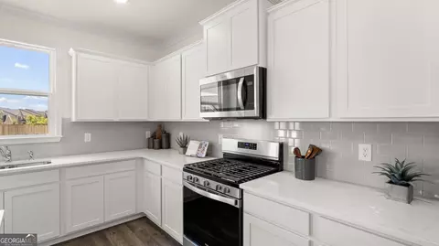 Kitchen - 664 Edgar St #LOT 157, Hampton, GA 30228 photo 6 of 6