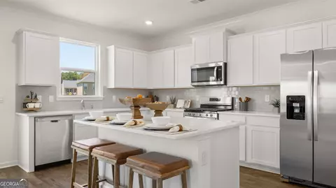 Kitchen - 664 Edgar St #LOT 157, Hampton, GA 30228 photo 2 of 6
