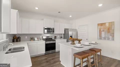 Kitchen - 664 Edgar St #LOT 157, Hampton, GA 30228 photo 3 of 6