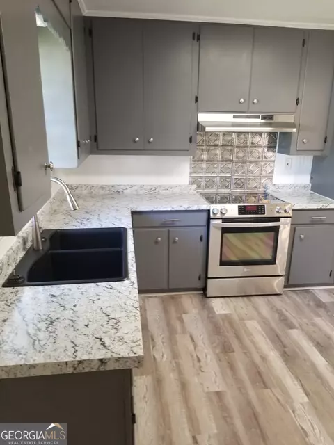 Kitchen - 305 S 17th Ave, Lanett, AL 36863 photo 1 of 1