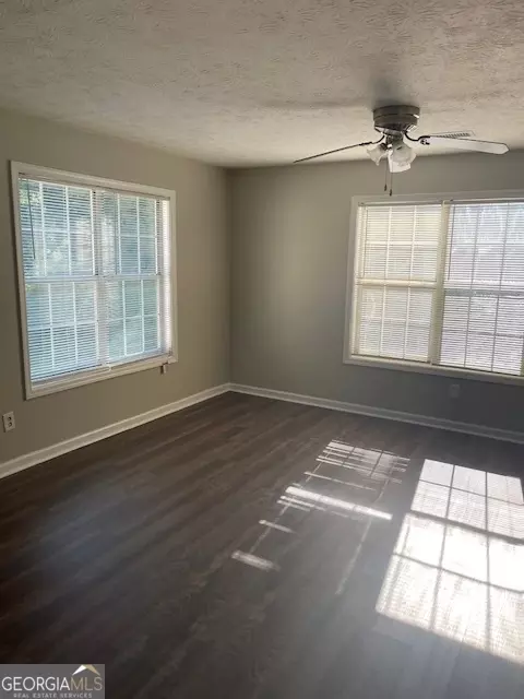 Living - 11684 Heritage Dr, Hampton, GA 30228 photo 7 of 16