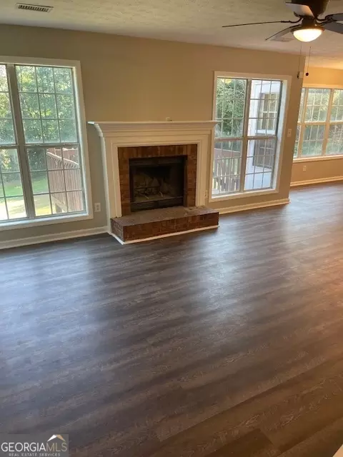 Living - 11684 Heritage Dr, Hampton, GA 30228 photo 1 of 16