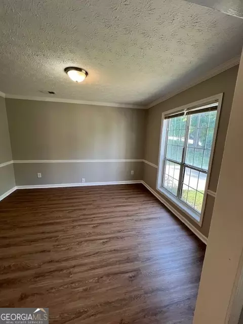 Living - 11684 Heritage Dr, Hampton, GA 30228 photo 12 of 16