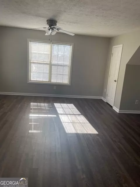 Living - 11684 Heritage Dr, Hampton, GA 30228 photo 6 of 16