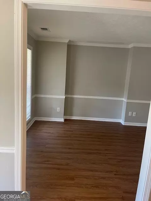 Living - 11684 Heritage Dr, Hampton, GA 30228 photo 10 of 16