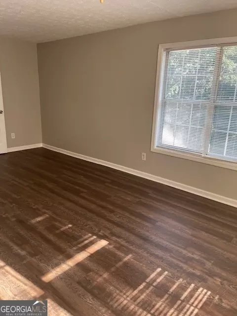 Living - 11684 Heritage Dr, Hampton, GA 30228 photo 8 of 16