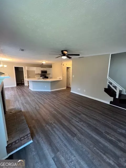 Living - 11684 Heritage Dr, Hampton, GA 30228 photo 14 of 16