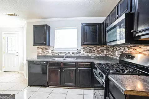 Kitchen - 4626 Derby Loop, Fairburn, GA 30213 photo 3 of 4