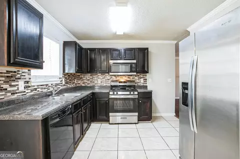 Kitchen - 4626 Derby Loop, Fairburn, GA 30213 photo 2 of 4