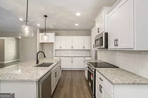 Kitchen - 228 Murphey Ave, Barnesville, GA 30204 photo 2 of 3
