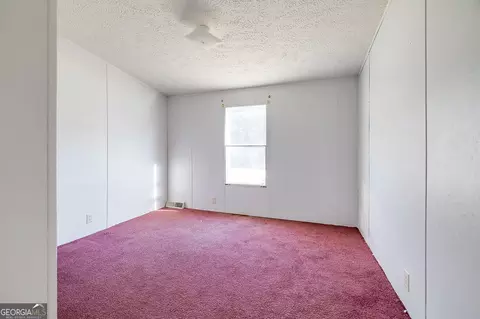 Bedroom - 162 Pearl Davis Rd, Springfield, GA 31329 photo 5 of 10
