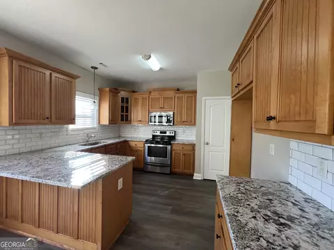 Kitchen - 207 N Pointe Dr, Lagrange, GA 30241 photo 1 of 2