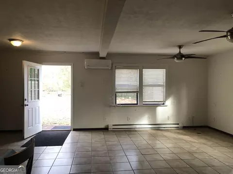 Living - 100 Anderson Dr, Hampton, GA 30228 photo 2 of 2