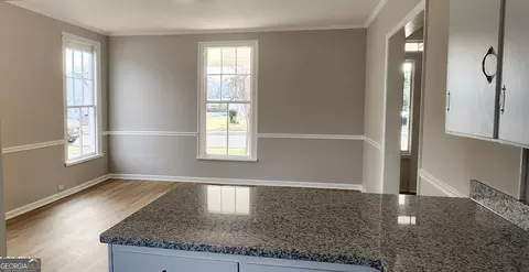 Living - 407 E Pine St, Vienna, GA 31092 photo 2 of 2