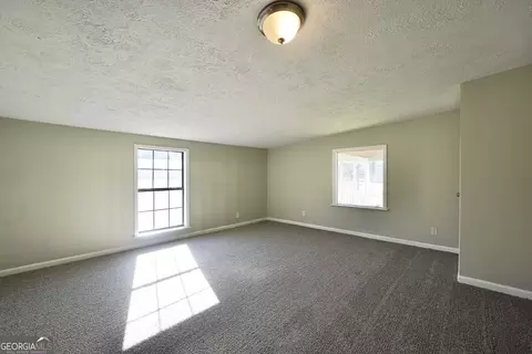Living - 2011 Highway 36 E, Milner, GA 30257 photo 3 of 4