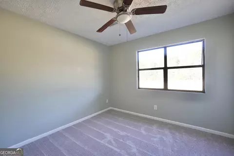 Bedroom - 2011 Highway 36 E, Milner, GA 30257 photo 2 of 4