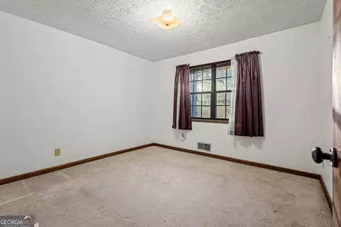 Bedroom - 11800 Pine Needle Ln, Hampton, GA 30228 photo 4 of 7