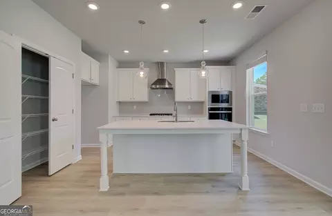 Kitchen - 237 Chiswick Loop, Stockbridge, GA 30281 photo 2 of 4