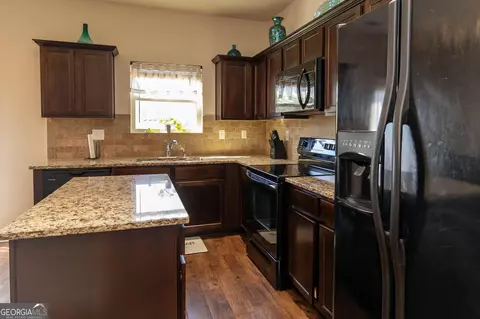 Kitchen - 1127 Lehavre Ct, Hampton, GA 30228 photo 2 of 2
