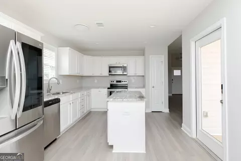 Kitchen - 103 Rocky Rd, Perry, GA 31069 photo 7 of 11