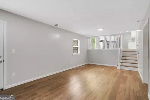 Living - 6972 Vesta Brook Dr, Morrow, GA 30260 photo 7 of 7
