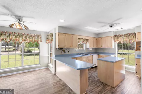 Kitchen - 595 Davis Rd, Pembroke, GA 31321 photo 2 of 3