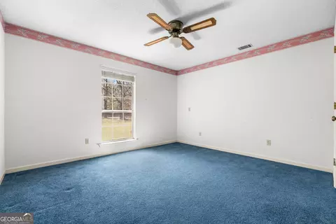 Bedroom - 595 Davis Rd, Pembroke, GA 31321 photo 2 of 4