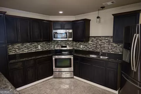 Kitchen - 65 Lotus Ln, Covington, GA 30016 photo 1 of 3