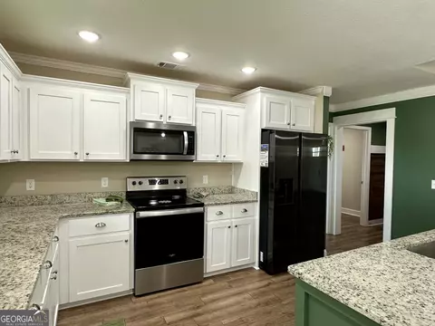 Kitchen - 104 Bluff Oak Dr, Brooklet, GA 30415 photo 5 of 7